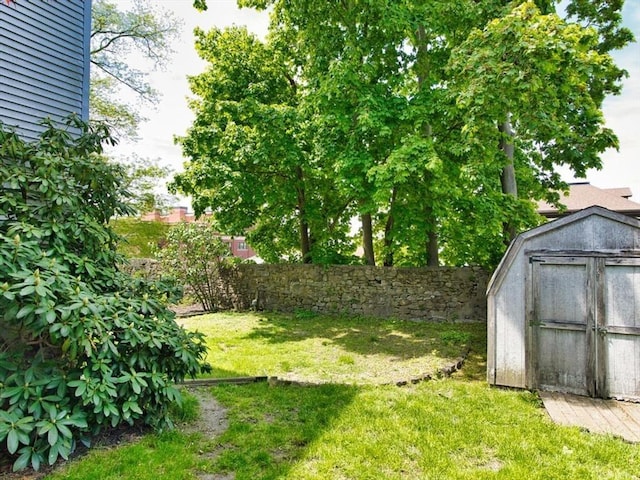 56 Gatehouse Dr, Fall River, MA 02720 - view of yard with a storage unit and an outdoor structure
