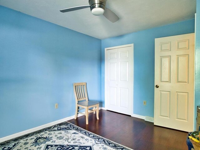 56 Gatehouse Dr, Fall River, MA 02720 - sitting room featuring a ceiling fan, baseboards, and dark wood-type flooring