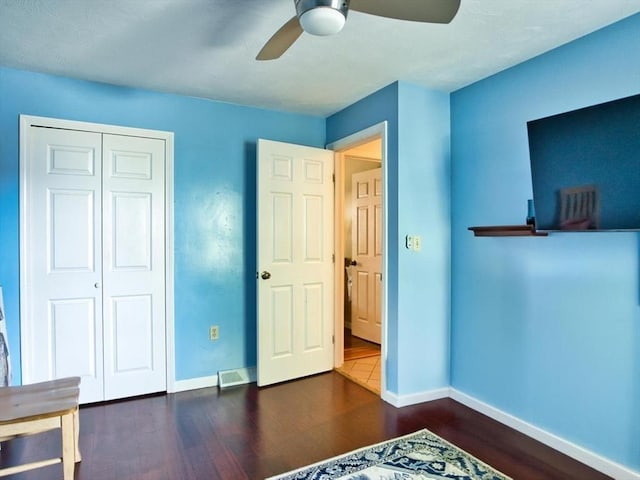 56 Gatehouse Dr, Fall River, MA 02720 - unfurnished bedroom featuring wood finished floors, baseboards, and a closet