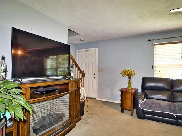 56 Gatehouse Dr, Fall River, MA 02720 - carpeted living room with stairway and baseboards
