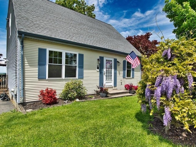 56 Gatehouse Dr, Fall River, MA 02720 - view of front of property featuring a front lawn and a shingled roof