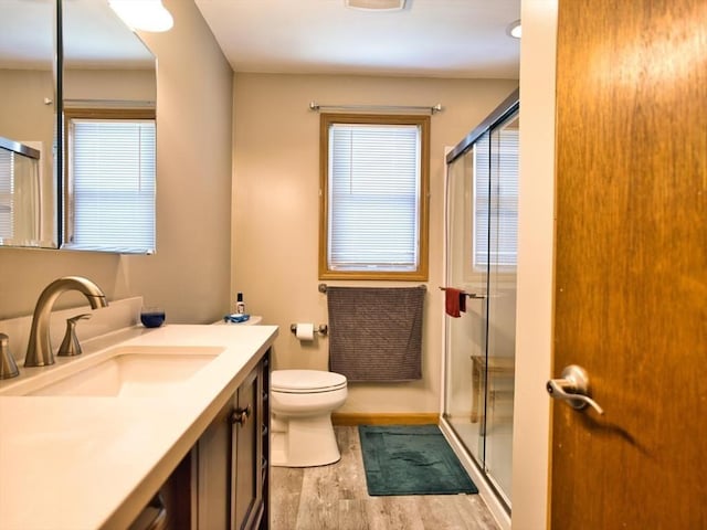 56 Gatehouse Dr, Fall River, MA 02720 - bathroom with wood finished floors, a shower stall, and plenty of natural light