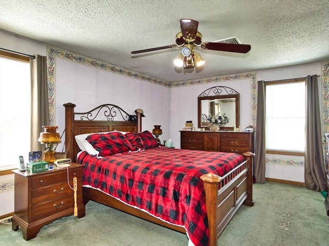 56 Gatehouse Dr, Fall River, MA 02720 - carpeted bedroom featuring a ceiling fan, a textured ceiling, and baseboards
