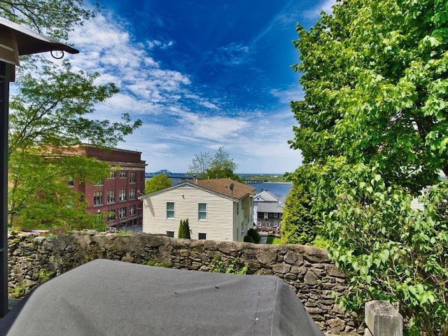 56 Gatehouse Dr, Fall River, MA 02720 - view of property exterior featuring a patio