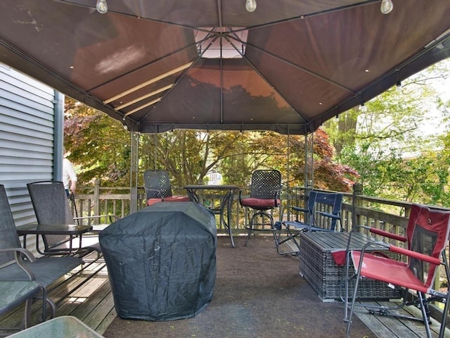 56 Gatehouse Dr, Fall River, MA 02720 - wooden deck with a grill, outdoor dining area, and a gazebo