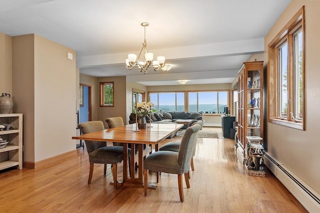 421 Legate Hill Rd, Charlemont, MA 01339 - dining room featuring baseboard heating, a chandelier, plenty of natural light, and beamed ceiling