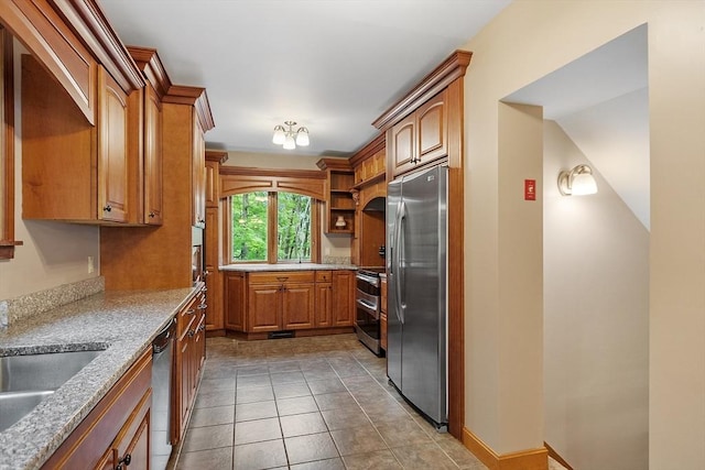 421 Legate Hill Rd, Charlemont, MA 01339 - kitchen with appliances with stainless steel finishes, brown cabinetry, open shelves, light tile patterned flooring, and light stone counters