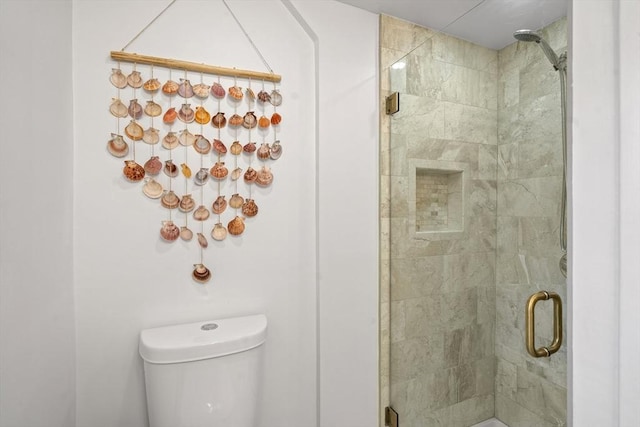 full bath with a stall shower and toilet