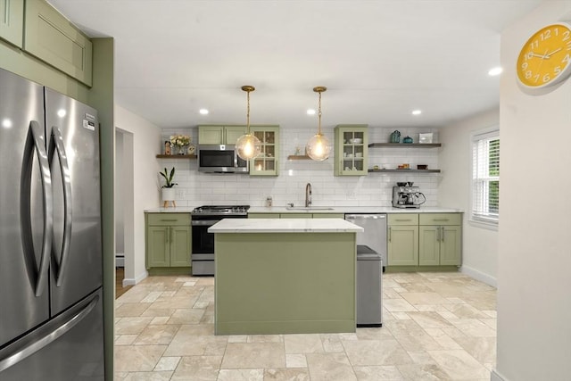 kitchen with green cabinets, stainless steel appliances, open shelves, a sink, and recessed lighting