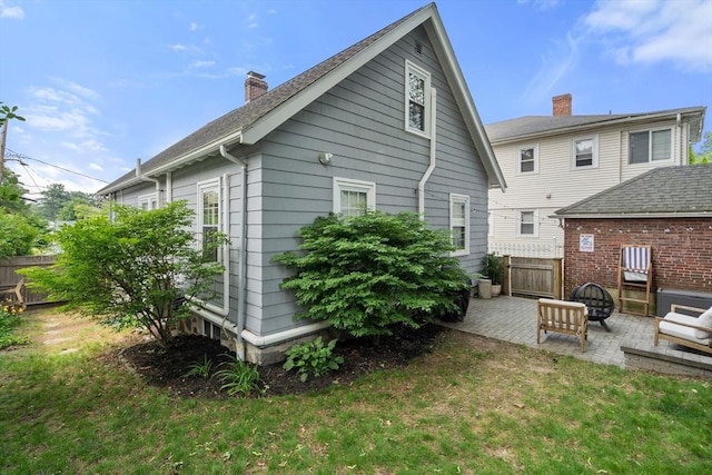 26 Edgebrook Rd, Boston, MA 02132 - back of house with a patio and a chimney