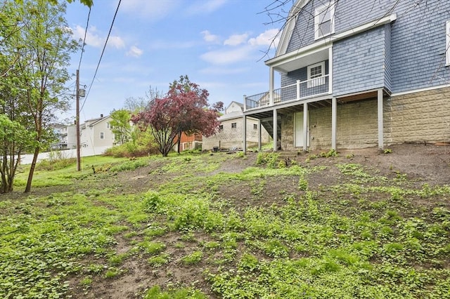 view of yard with a deck