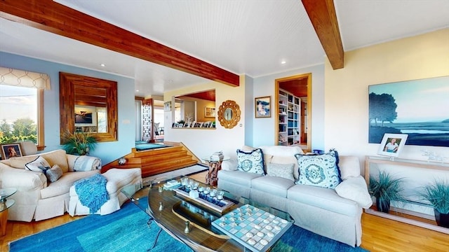 living area featuring beamed ceiling, recessed lighting, and wood finished floors