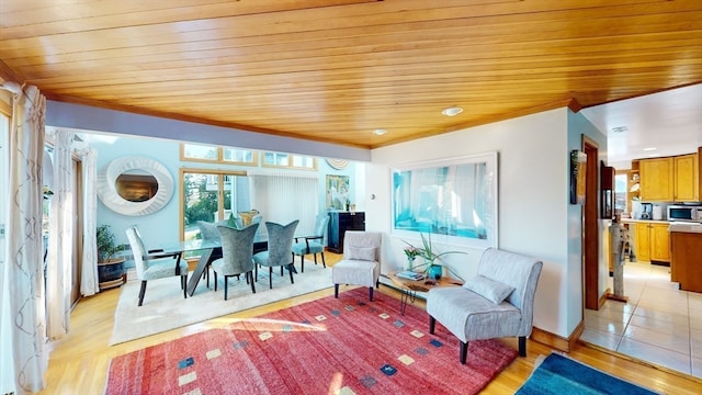 interior space with light wood-type flooring and wood ceiling