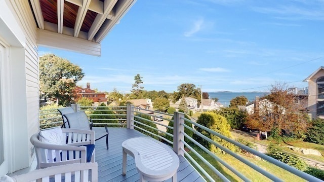 balcony featuring a water view