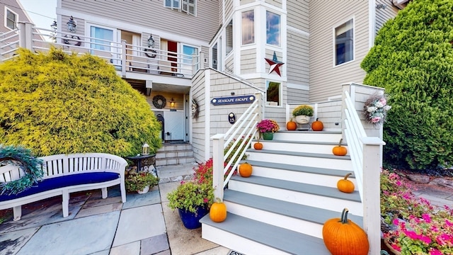 property entrance with a balcony