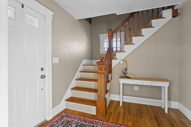 stairway with wood-type flooring