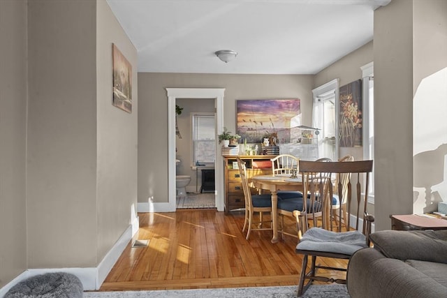 dining room featuring wood-type flooring