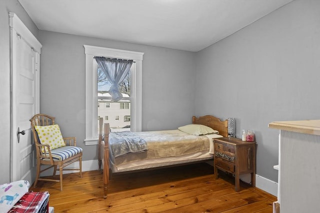 bedroom featuring hardwood / wood-style floors