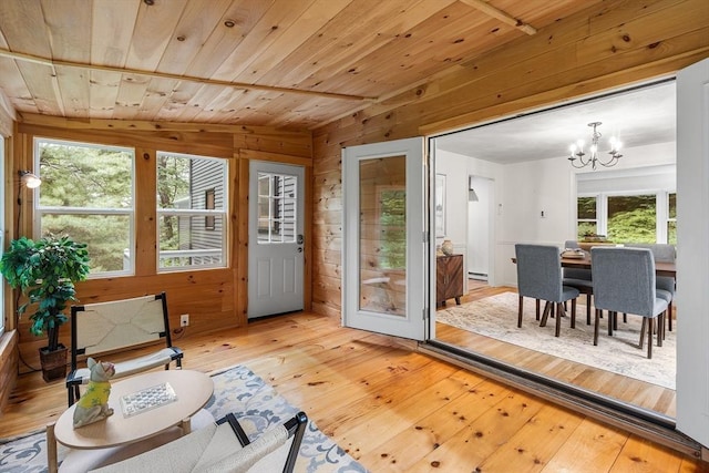 41 Harvey Ln, Westborough, MA 01581 - sunroom with a chandelier, healthy amount of natural light, and a baseboard heating unit