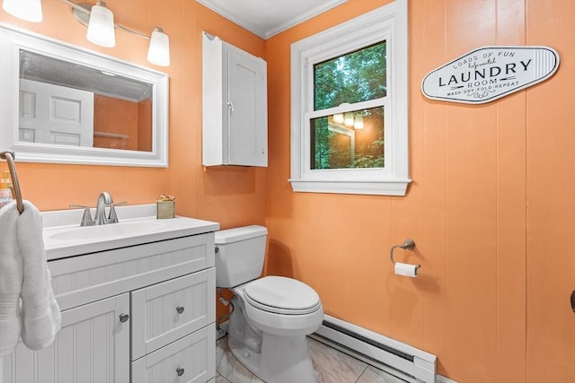 41 Harvey Ln, Westborough, MA 01581 - half bathroom with a baseboard heating unit, vanity, and ornamental molding