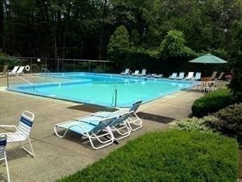 121 Tall Oaks Dr Unit F, Weymouth, MA 02190 - community pool with a patio