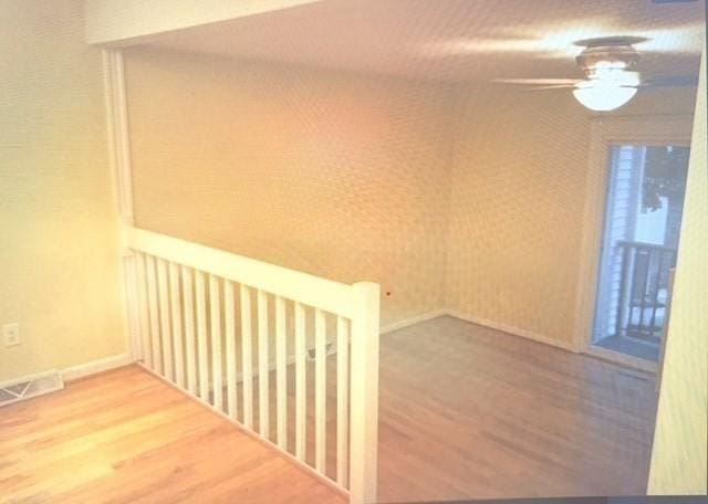 121 Tall Oaks Dr Unit F, Weymouth, MA 02190 - spare room featuring wood finished floors and ceiling fan