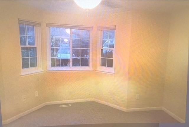 121 Tall Oaks Dr Unit F, Weymouth, MA 02190 - unfurnished room featuring baseboards