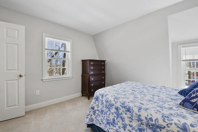 bedroom featuring carpet floors and baseboards