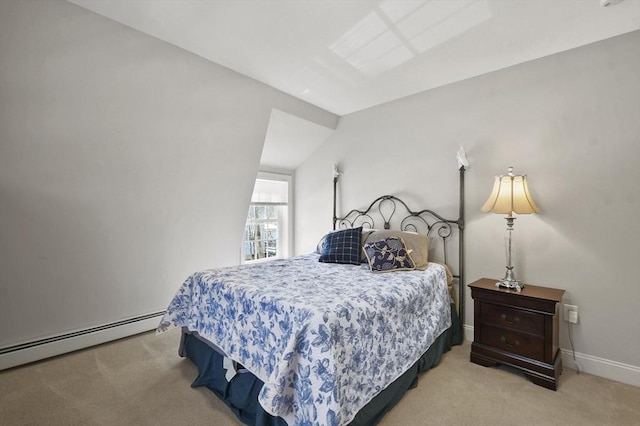 bedroom with carpet floors, a baseboard radiator, and baseboards