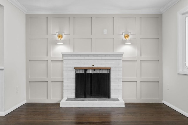 unfurnished living room with dark wood-type flooring, a fireplace, and crown molding