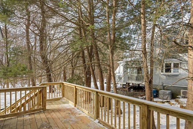 view of snow covered deck