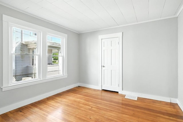 12-14 Kendall St, Springfield, MA 01104 - unfurnished room featuring ornamental molding, light wood-style flooring, and baseboards