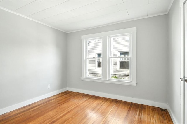 12-14 Kendall St, Springfield, MA 01104 - spare room featuring crown molding, baseboards, and light wood-style floors