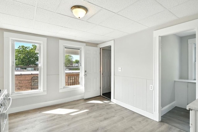 12-14 Kendall St, Springfield, MA 01104 - foyer entrance featuring light wood finished floors, a drop ceiling, baseboards, and healthy amount of natural light