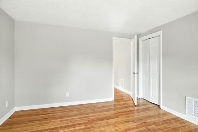 12-14 Kendall St, Springfield, MA 01104 - spare room with light wood-type flooring and baseboards