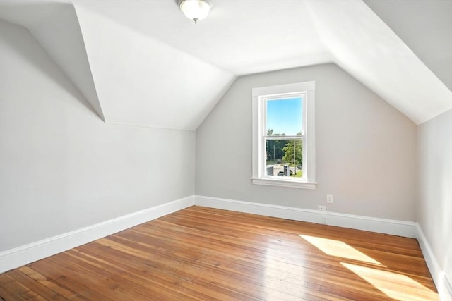12-14 Kendall St, Springfield, MA 01104 - additional living space with lofted ceiling, wood-type flooring, and baseboards