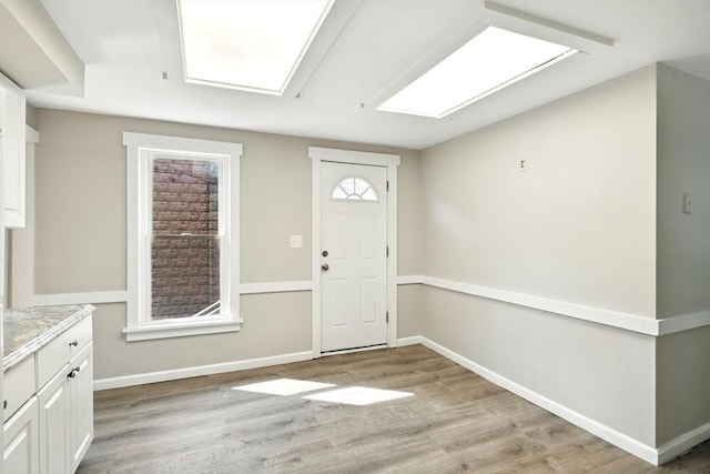 12-14 Kendall St, Springfield, MA 01104 - entrance foyer featuring light wood-style floors, plenty of natural light, and baseboards