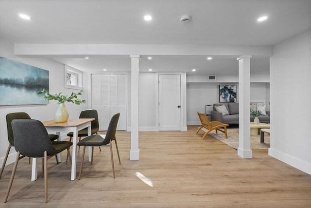 dining area featuring visible vents, recessed lighting, light wood finished floors, decorative columns, and baseboards