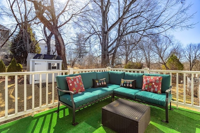 exterior space with an outdoor living space, an outbuilding, and a storage shed