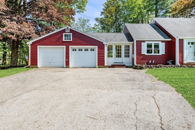 13 Clarks Rd, Amesbury, MA 01913 - view of front of house featuring asphalt driveway, roof with shingles, a garage, and a front lawn