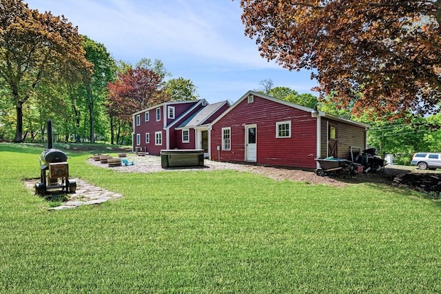 13 Clarks Rd, Amesbury, MA 01913 - view of side of property featuring a hot tub and a yard