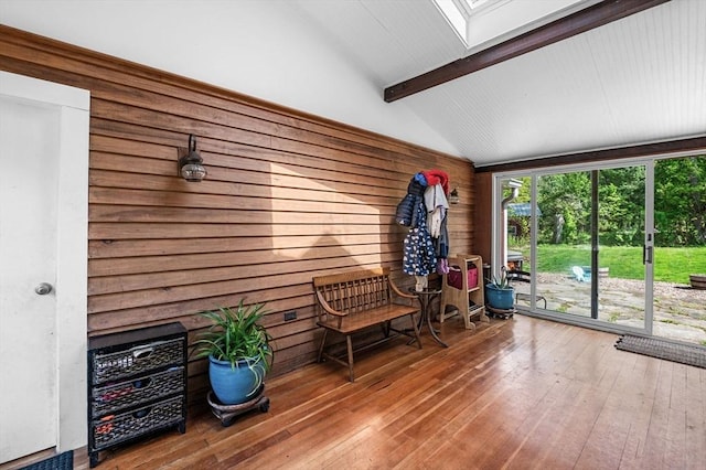 13 Clarks Rd, Amesbury, MA 01913 - sitting room with a skylight, wood walls, and hardwood / wood-style floors