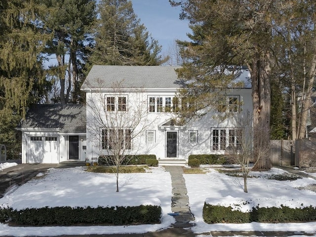 view of front of property with a garage