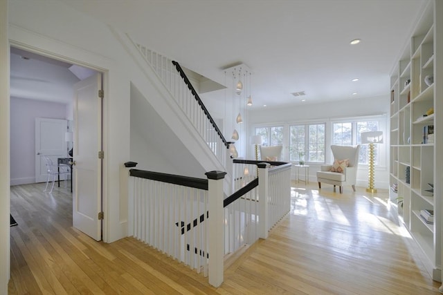 hall featuring light hardwood / wood-style flooring