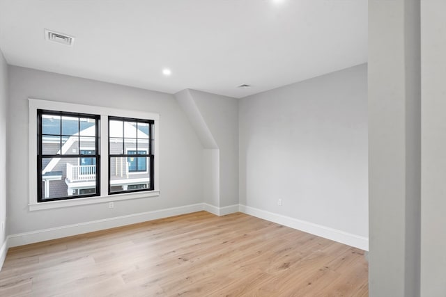 unfurnished room featuring light hardwood / wood-style flooring