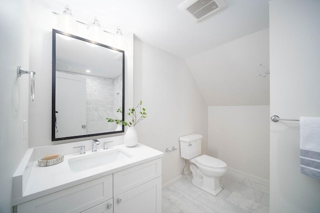 full bathroom with marble finish flooring, toilet, lofted ceiling, baseboards, and vanity