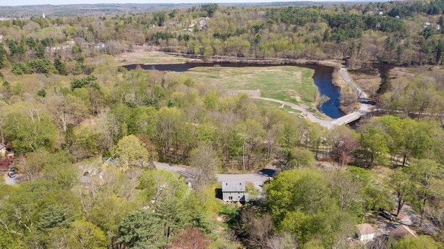 bird's eye view with a wooded view and a water view
