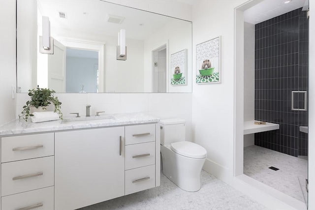 full bathroom with visible vents, toilet, tile walls, vanity, and tiled shower
