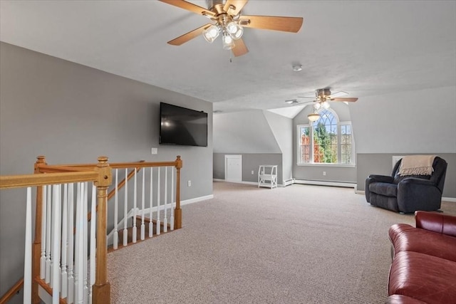 carpeted living area with baseboards, ceiling fan, baseboard heating, and vaulted ceiling