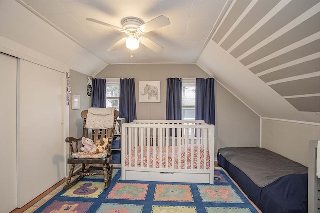 bedroom with ceiling fan and vaulted ceiling